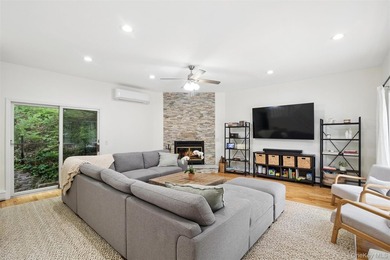 Nestled on a private and picturesque .88-acre property, this - photo 3