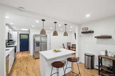 Nestled on a private and picturesque .88-acre property, this - photo 4
