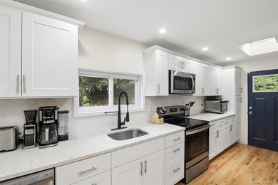 Nestled on a private and picturesque .88-acre property, this - photo 6