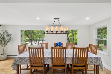 Nestled on a private and picturesque .88-acre property, this - photo 8