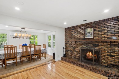 Nestled on a private and picturesque .88-acre property, this - photo 9