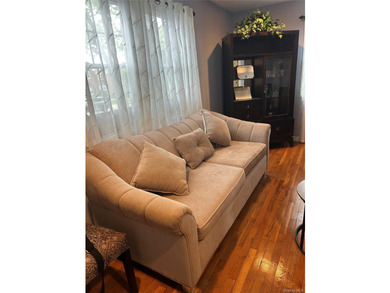 Must see !!!!!This spacious first floor unit located in the - photo 1