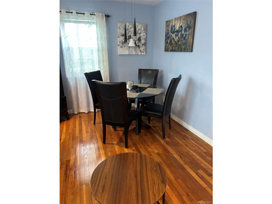 Must see !!!!!This spacious first floor unit located in the - photo 2