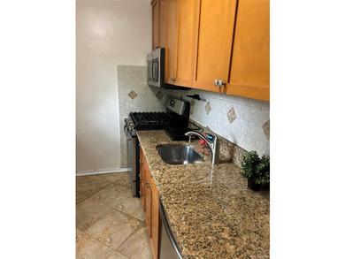 Must see !!!!!This spacious first floor unit located in the - photo 3