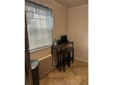Must see !!!!!This spacious first floor unit located in the - photo 4