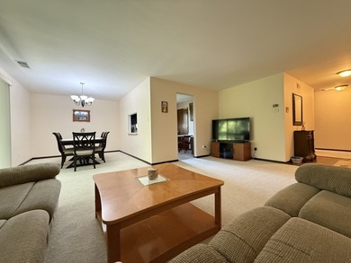 Welcome to this beautifully maintained second-floor condo in the - photo 4
