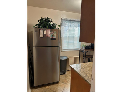 Must see !!!!!This spacious first floor unit located in the - photo 5