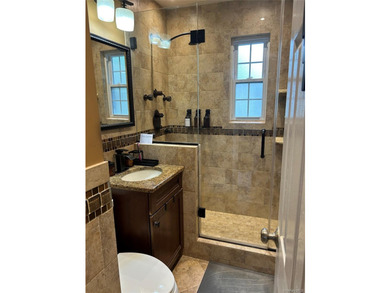 Must see !!!!!This spacious first floor unit located in the - photo 6