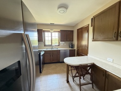 Welcome to this beautifully maintained second-floor condo in the - photo 6