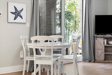 Escape to the perfect beach haven with this beautifully upgraded - photo 2