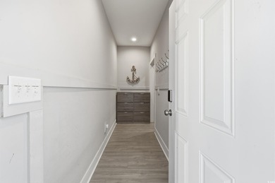 Step into this beautifully maintained coastal retreat, where