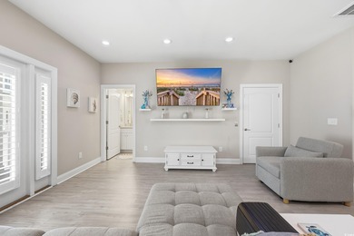 Step into this beautifully maintained coastal retreat, where