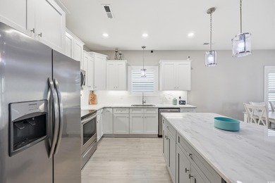 Step into this beautifully maintained coastal retreat, where