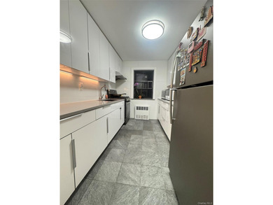 Located in a beautiful and well-maintained co-op building in the