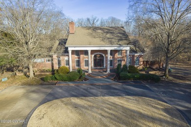 This private estate is located in the gated Deepwood Subdivision