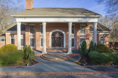 This private estate is located in the gated Deepwood Subdivision