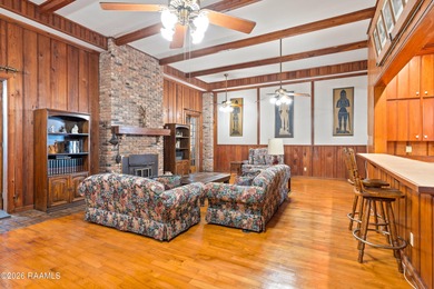 Set on 27 wooded acres in Lafayette, LA, this rare private - photo 4