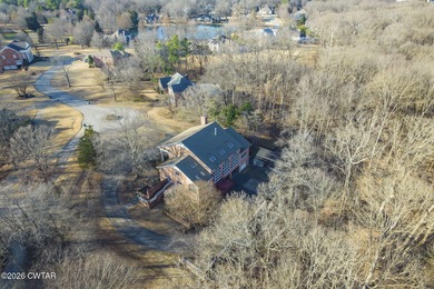 This private estate is located in the gated Deepwood Subdivision