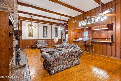 Set on 27 wooded acres in Lafayette, LA, this rare private - photo 5