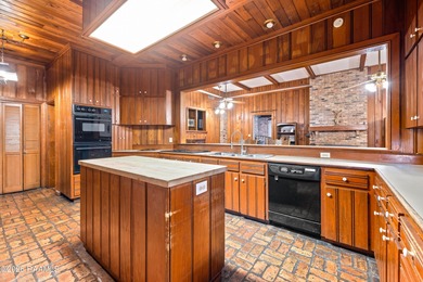 Set on 27 wooded acres in Lafayette, LA, this rare private - photo 6