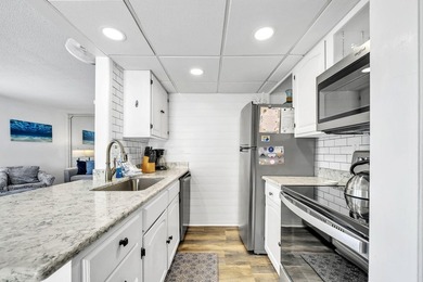 Sandpiper Cove 1013 is a beautifully updated coastal retreat - photo 7