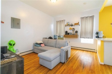 Introducing a distinguished three-family residence offering both - photo 2