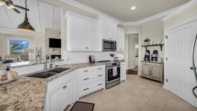 Enjoy spectacular lake and golf course views from this 5 bedroom - photo 13