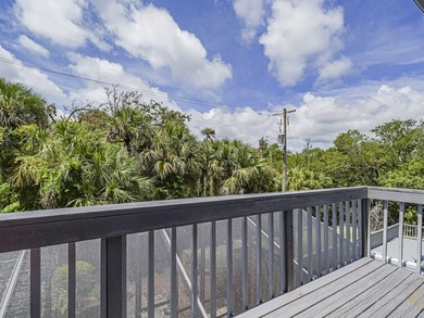 Are you dreaming of a beach house to call your own? This updated - photo 14