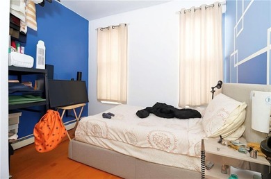 Introducing a distinguished three-family residence offering both - photo 6