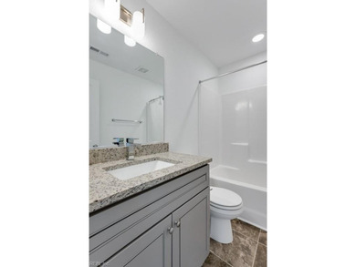 This beautifully maintained 3 story townhouse offers the perfect - photo 22