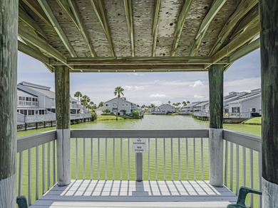 Are you dreaming of a beach house to call your own? This updated - photo 29
