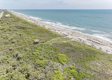 Are you dreaming of a beach house to call your own? This updated - photo 41