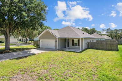 Welcome home! Built in 2021, this pristine residence perfectly - photo 1