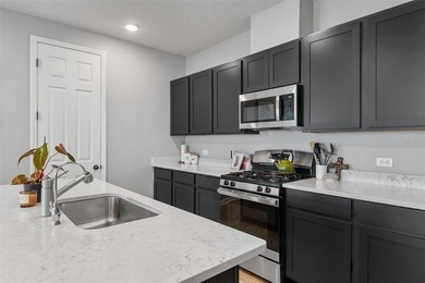 Welcome to this beautiful 4-bedroom, 3-bath home located in the - photo 15