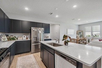 Welcome to this beautiful 4-bedroom, 3-bath home located in the - photo 17