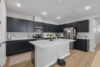 Welcome to this beautiful 4-bedroom, 3-bath home located in the - photo 18