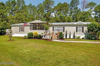 Welcome home to this spacious 4-bedroom, 2-bath manufactured - photo 1