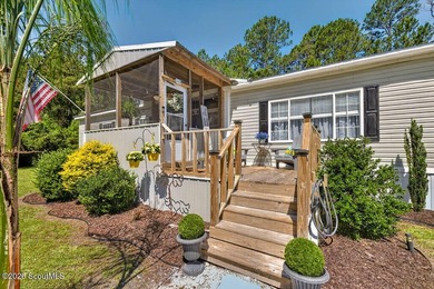 Welcome home to this spacious 4-bedroom, 2-bath manufactured - photo 2