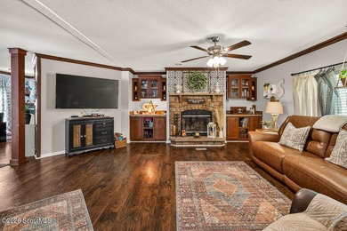 Welcome home to this spacious 4-bedroom, 2-bath manufactured - photo 6