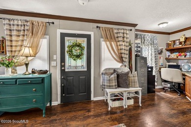 Welcome home to this spacious 4-bedroom, 2-bath manufactured - photo 7
