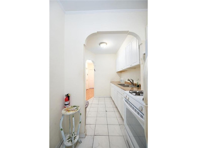 All brick 2 family home with private drive. 2 bedrooms in each - photo 8