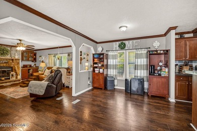 Welcome home to this spacious 4-bedroom, 2-bath manufactured - photo 8