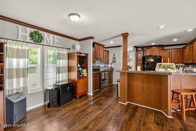 Welcome home to this spacious 4-bedroom, 2-bath manufactured - photo 9