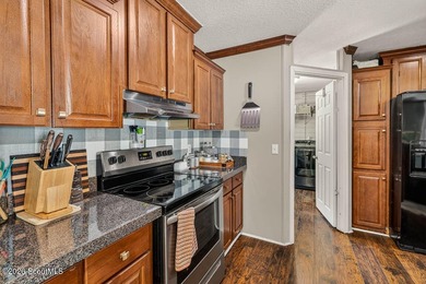 Welcome home to this spacious 4-bedroom, 2-bath manufactured - photo 10