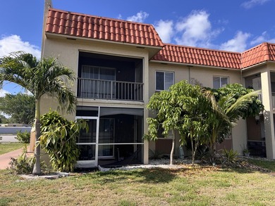 FOR SALE-Second floor condo 2 bedroom 1 bath. AC and Water - photo 1