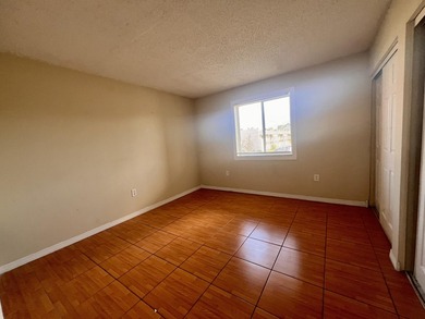 FOR SALE-Second floor condo 2 bedroom 1 bath. AC and Water - photo 9