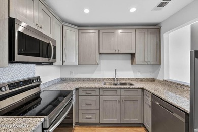 Beautifully Updated Coastal Condo with Pre-Paid HOA Dues! Here's - photo 1