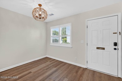 Beautifully Updated Coastal Condo with Pre-Paid HOA Dues! Here's - photo 4