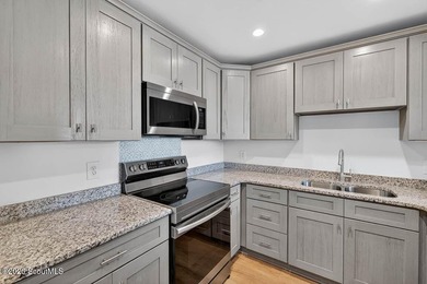 Beautifully Updated Coastal Condo with Pre-Paid HOA Dues! Here's - photo 6