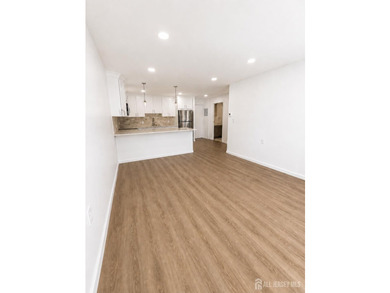 Freshly and meticulously renovated in 2026, this exceptional - photo 5